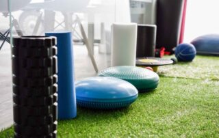 Assorted sensory tools and balance equipment used in pediatric occupational therapy sessions in Phnom Penh to support sensory integration and motor development.