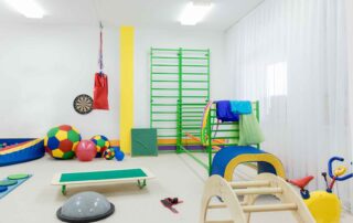 Sensory room with colorful equipment designed to support sensory integration during occupational therapy sessions at OrbRom Center Phnom Penh