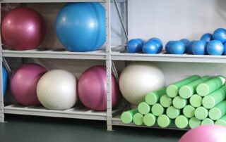 Therapy balls, foam rollers, and sensory equipment used in pediatric occupational therapy in Phnom Penh to support strength, coordination, and regulation.